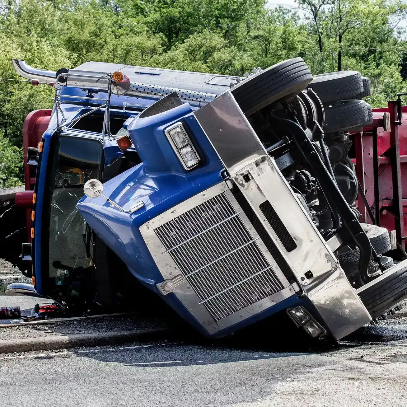 Overturned semi-truck after rollover accident on highway