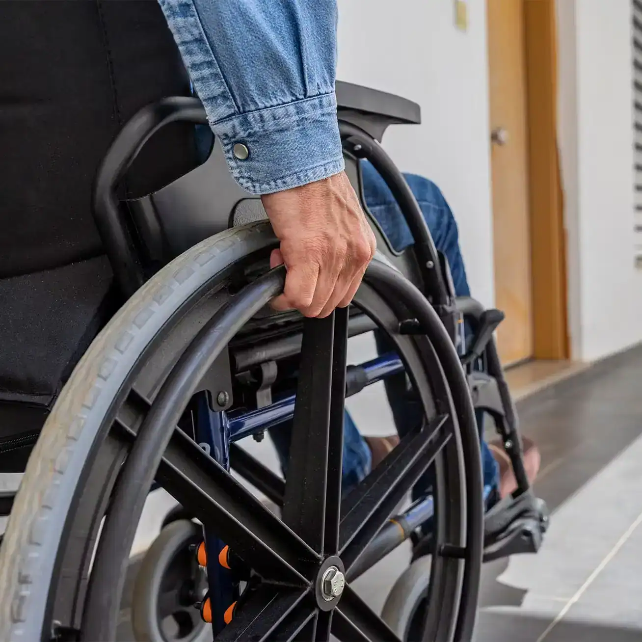 Accident victim in wheelchair seeking legal help from Houston personal injury lawyer after serious injury