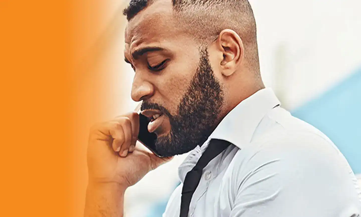 Injured man making phone call after accident to contact a personal injury lawyer for legal help.