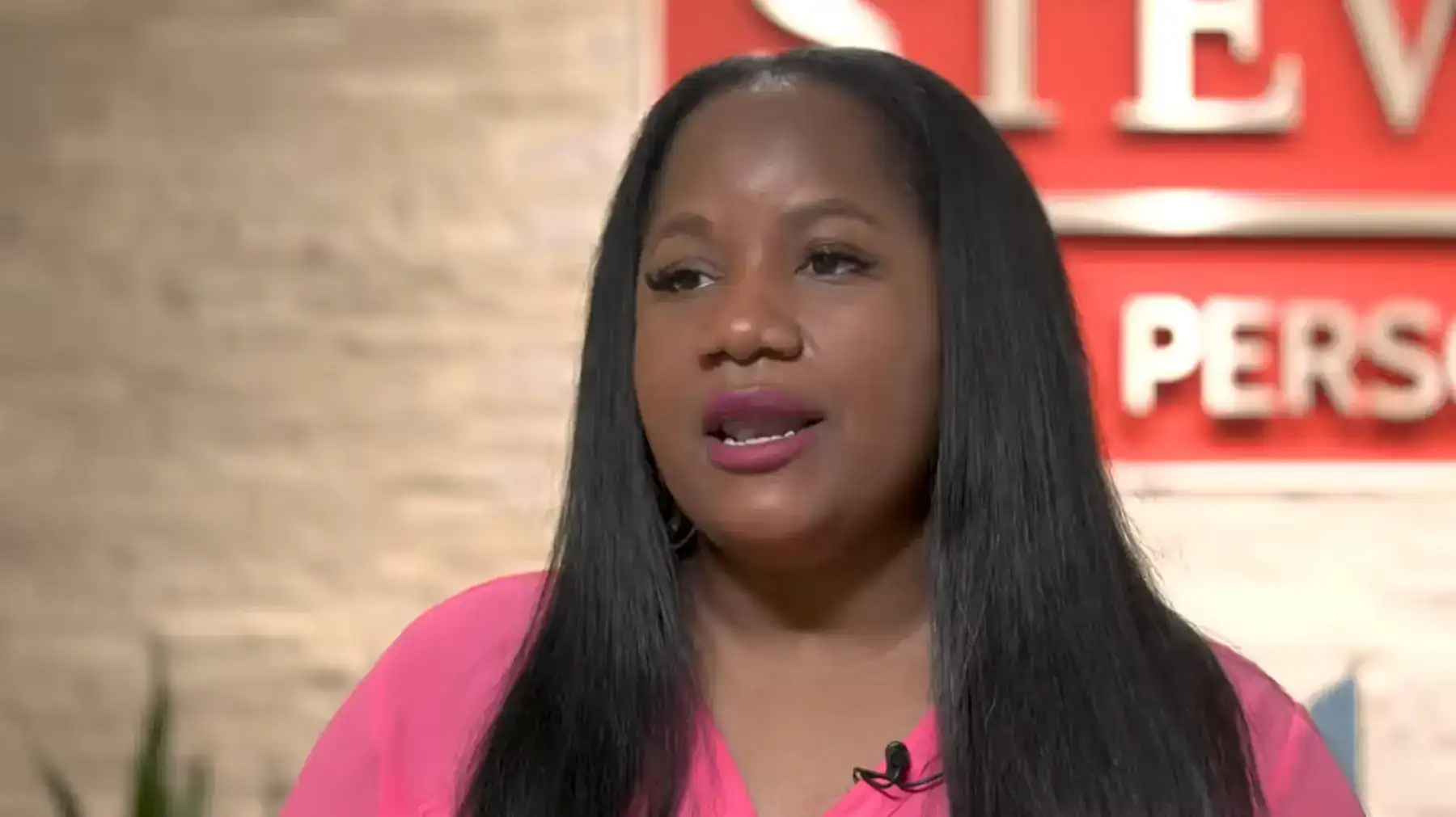 Woman giving testimonial about her positive experience with Trust Guss Houston personal injury lawyers