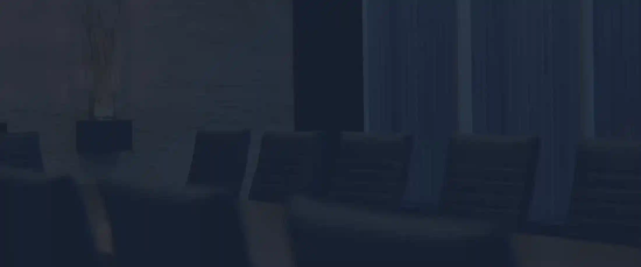 Modern conference room at Stewart J. Guss Injury Lawyers office with chairs and meeting table