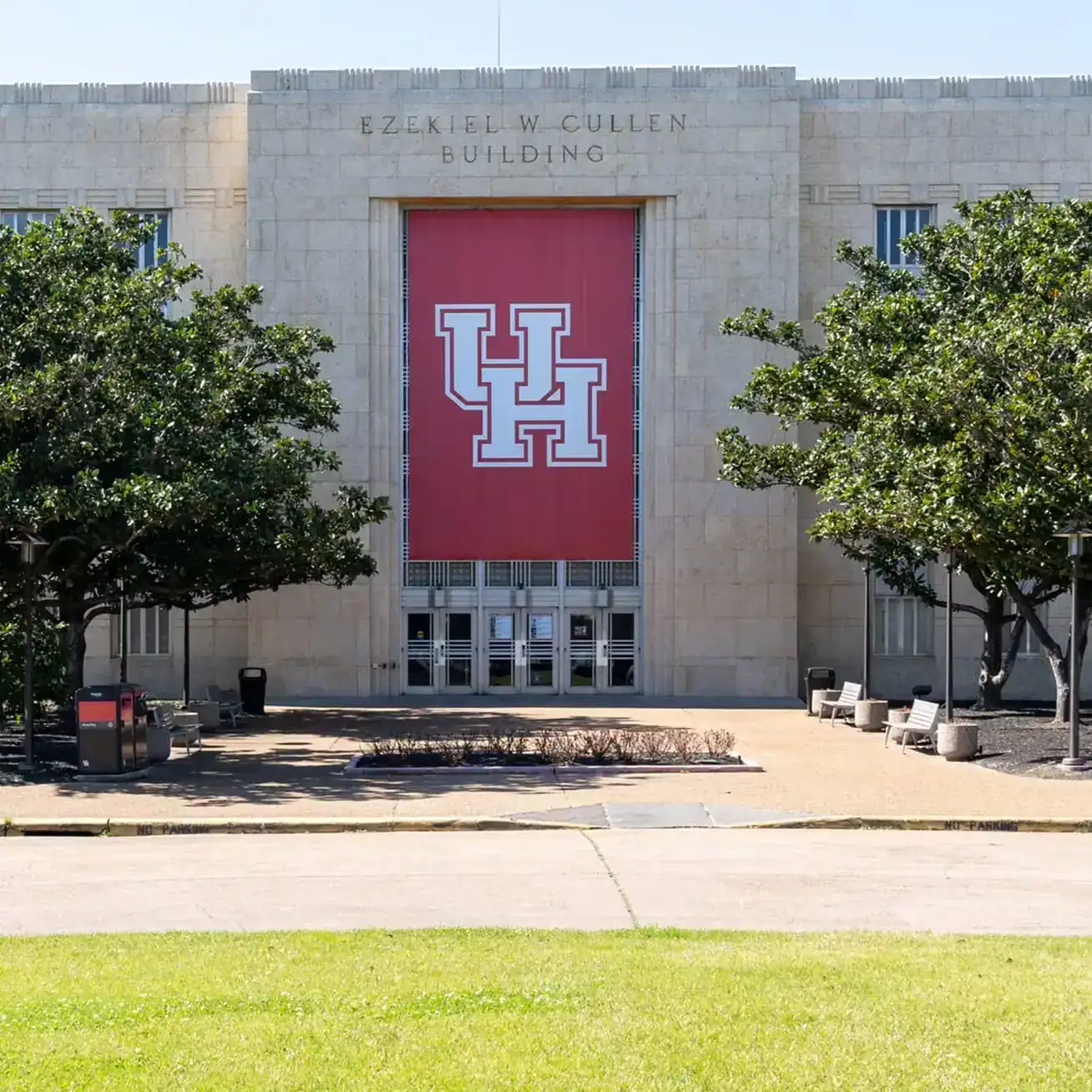 Ezekiel W. Cullen Building at University of Houston with large UH logo banner on front entrance
