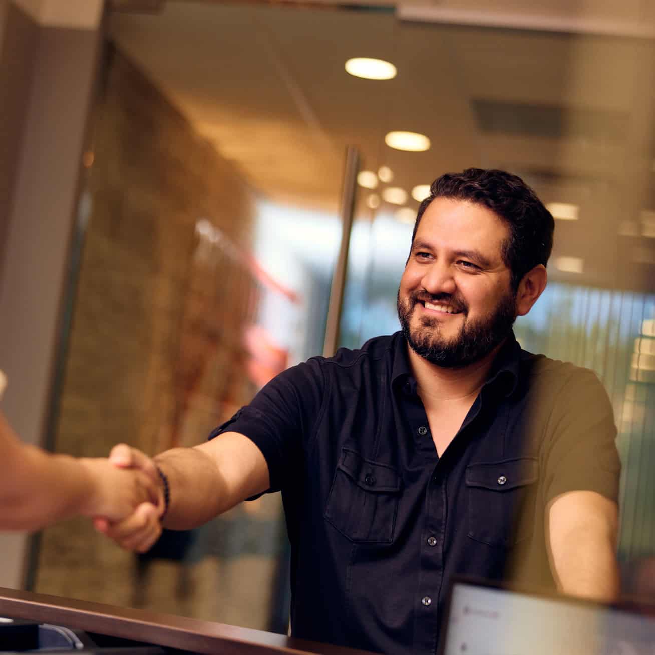 Client Handshake Personal Injury Lawyer Office