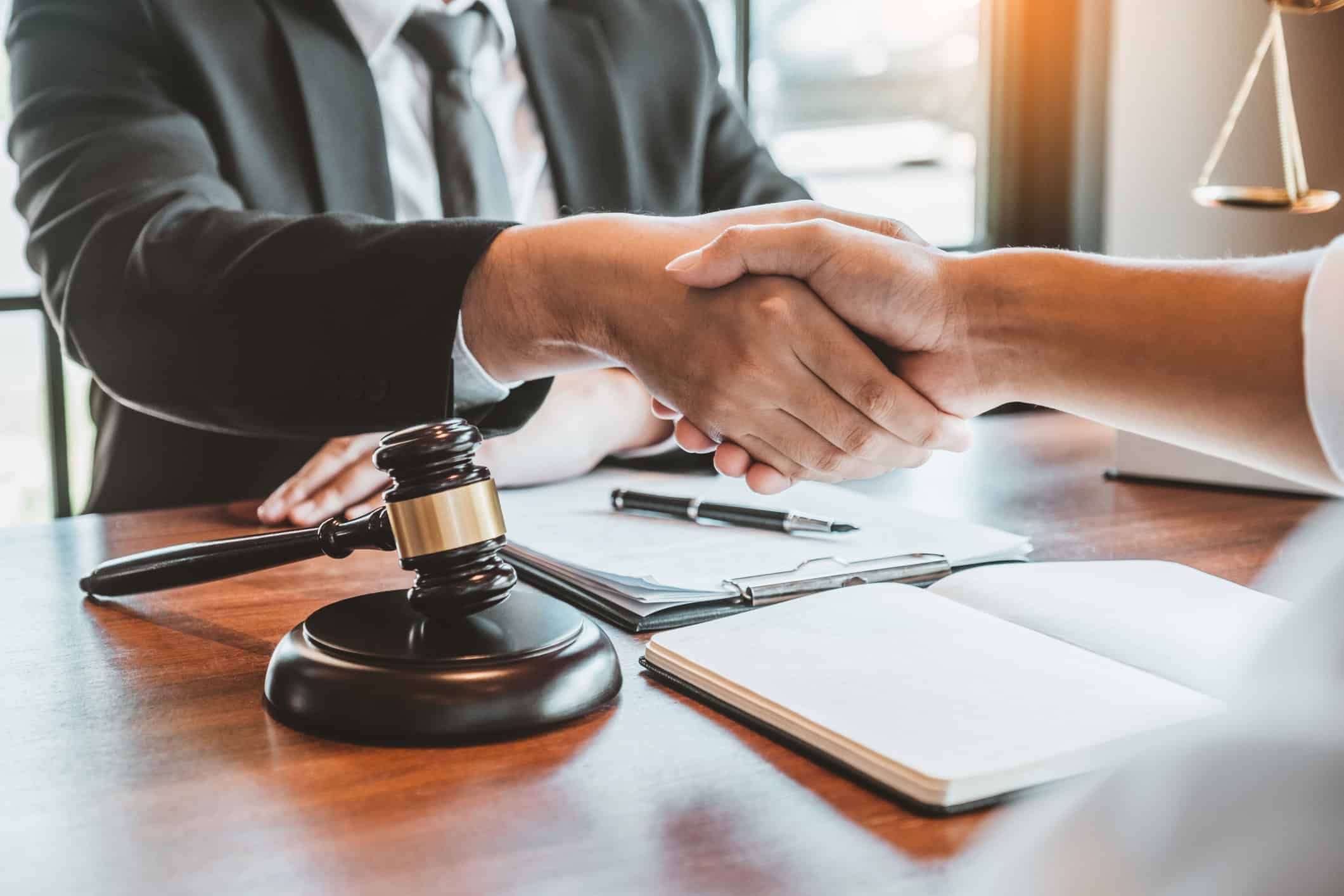 Personal Injury Lawyer Legal Settlement Handshake
