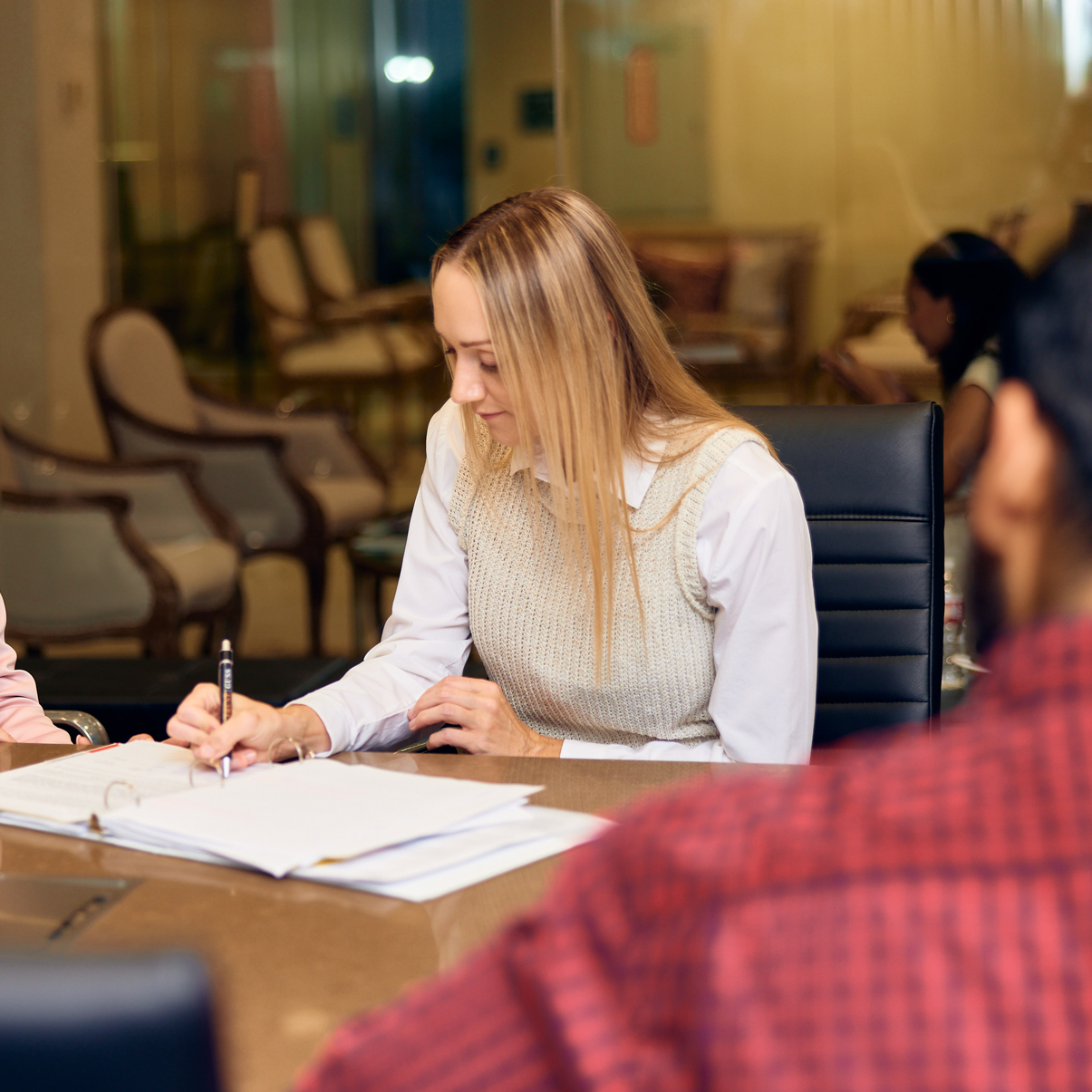 Meisler Looking Over Documents With A Client